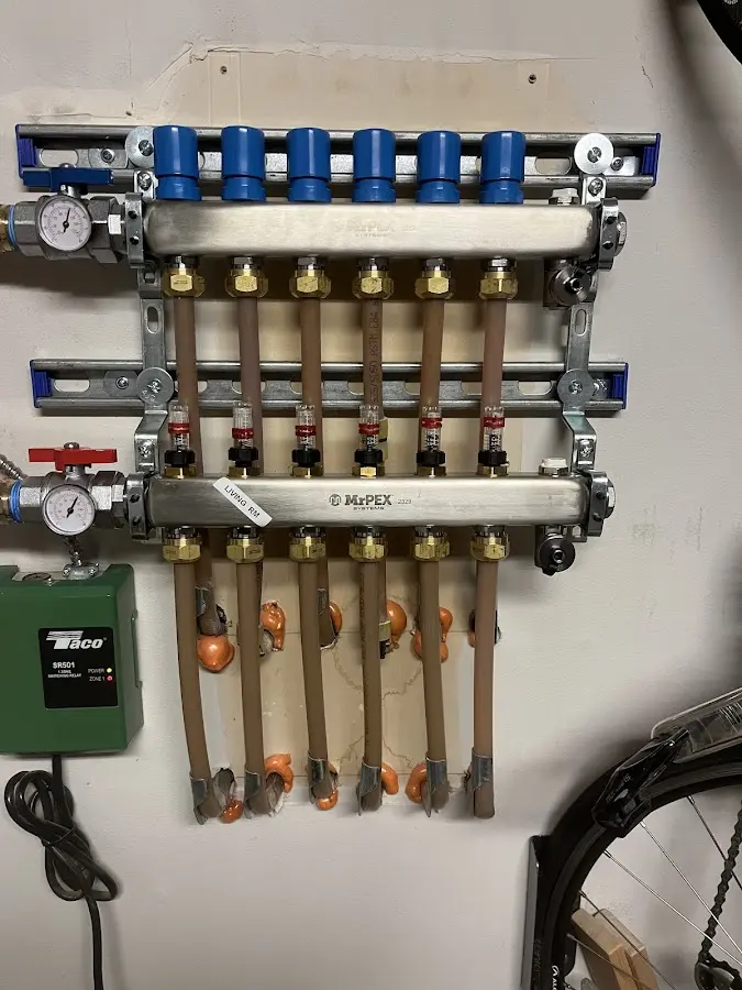 Plumber performing Water Heater Repair at a residential property in Lake of the Woods